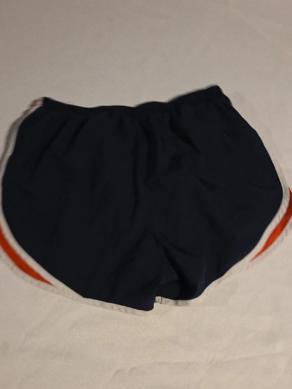 Nike Women’s Navy Athletic Shorts with Orange and White Trim